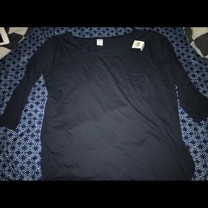 A blue hollister shirt .